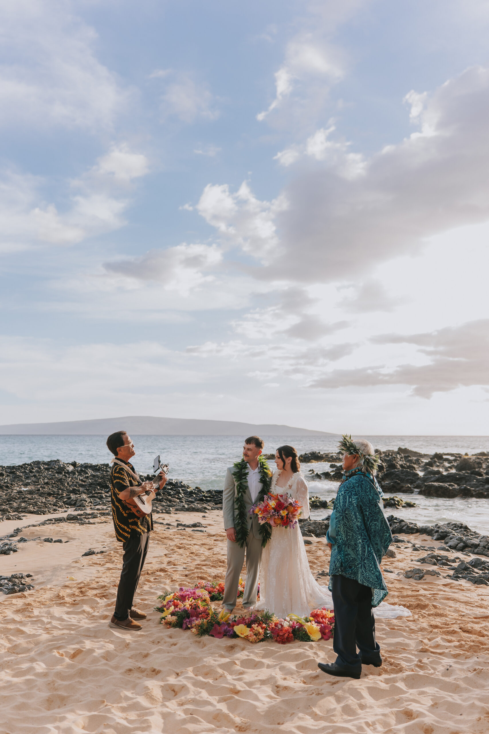Bridget and Nick during their Makena Cove elopement ceremony in Maui