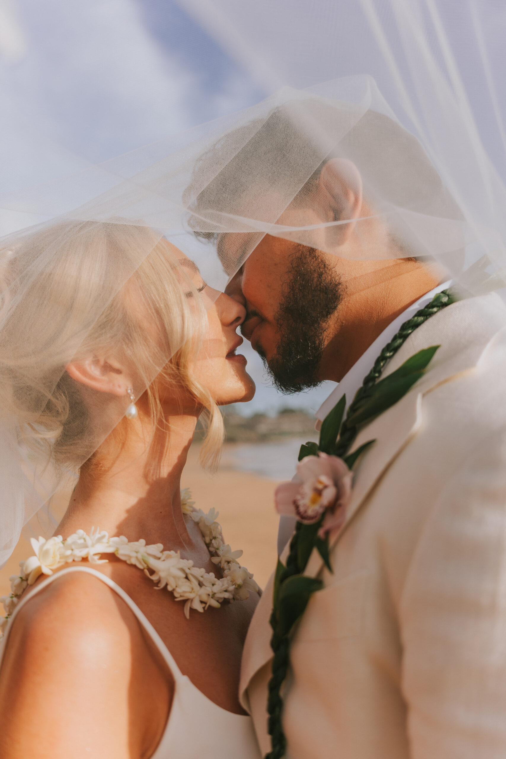 Kevin and Sarah during their Poʻolenalena Beach elopement in Maui